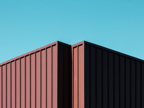 brown wooden fence under blue sky during daytime