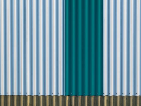 white blue and green striped textile
