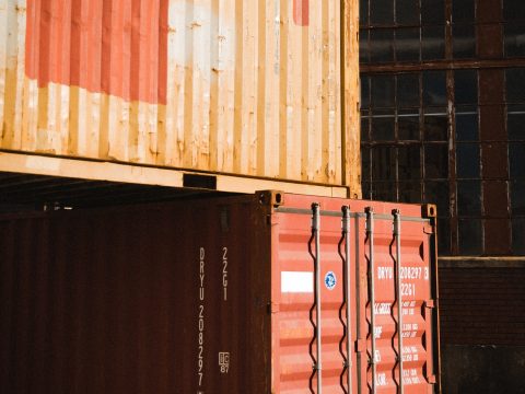 brown and red shipping containers